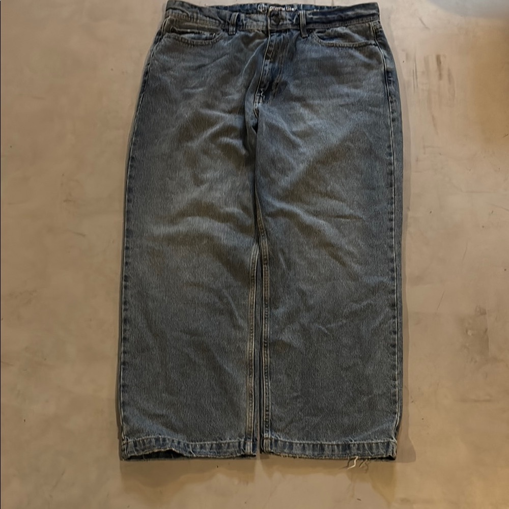 Extremely baggy blue jeans